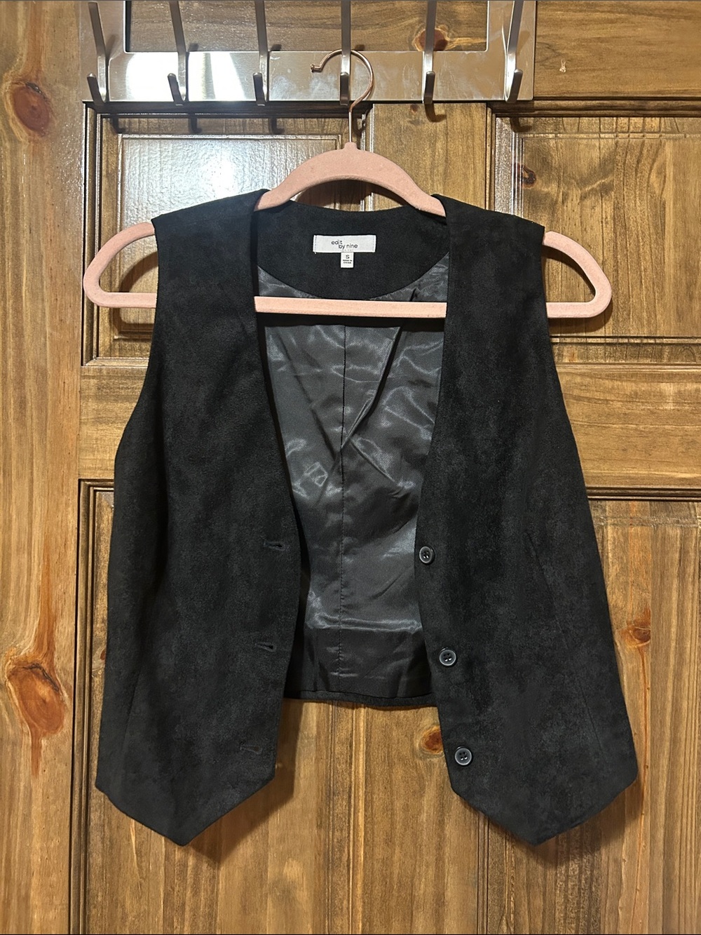 Black suede like material vest.